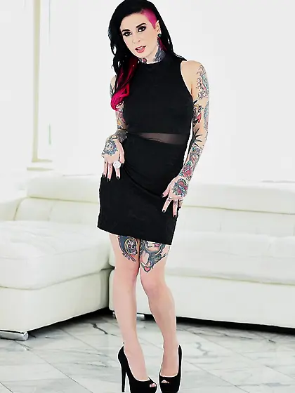 Emo MILF poses in a black dress and then quickly takes it off to