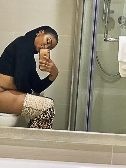 Ebony Women on the toilet
