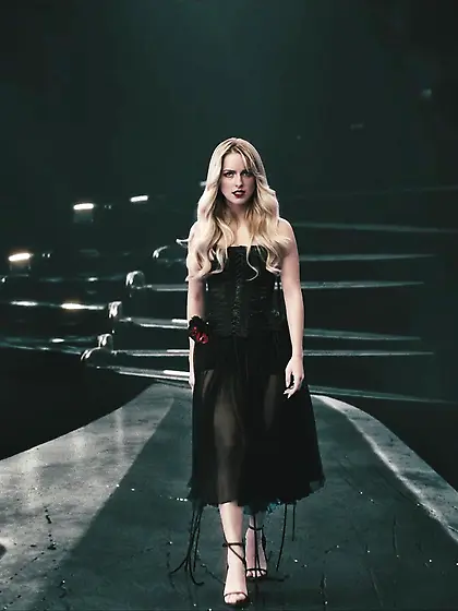 McKenna Grace in a black dress