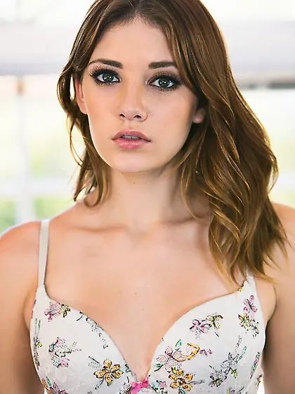 Young nympho takes off her cute lingerie and poses naked on mass