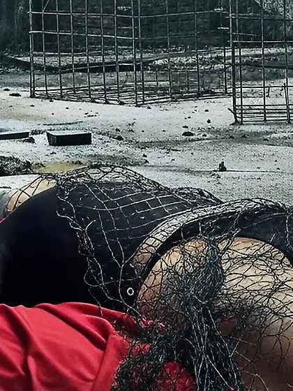 Black Superhero captured in netting.  KO and fondle