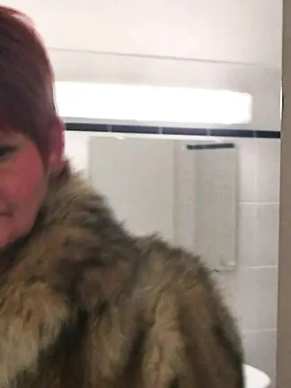 Secretly filmed in a fur coat