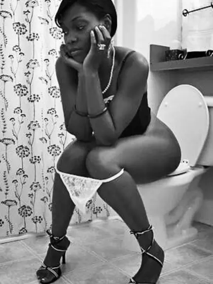 Ebony Women on the toilet
