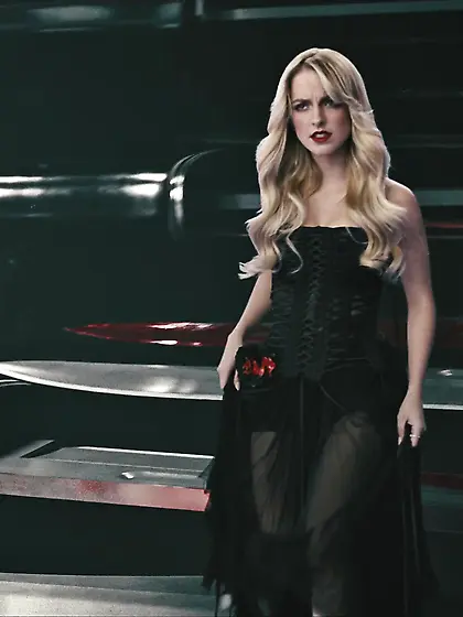 McKenna Grace in a black dress