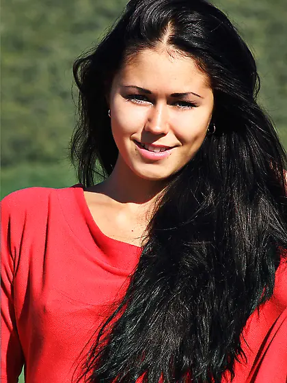 Beautiful brunette with smoothly tanned body Macy B is undressin