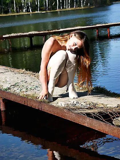 Ashanti A takes her lingerie buy the river and teases us wearing