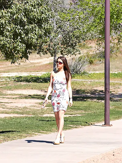 Karina Kay pulls up her sexy dress and shows her black panty and