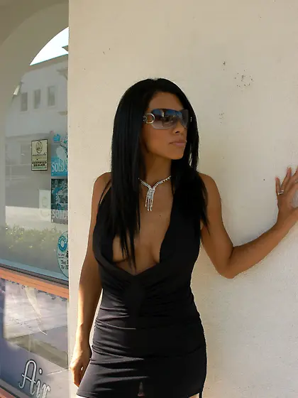 Dress-wearing ebony hottie gets fucked by a big-dicked white dud