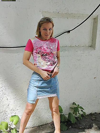 Pissing outdoor near the house