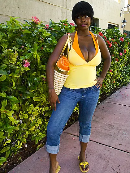 Chocolate hottie,  Stacy Adams,  shows off her big boobs and her c