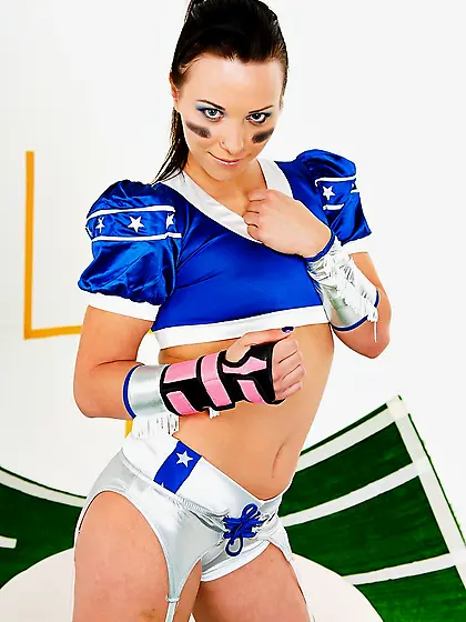Sexy brunette football uniform
