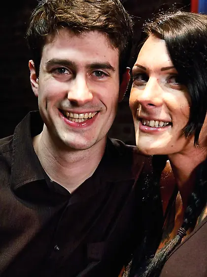 Dollar bills surround saucy