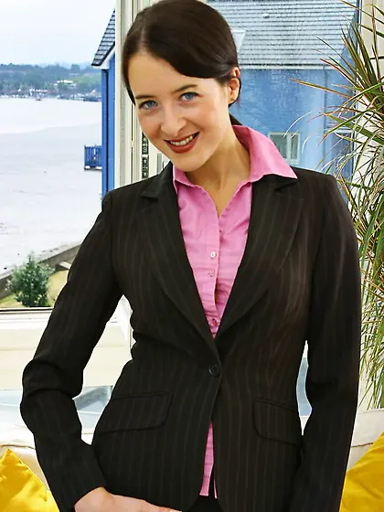 Naughty brunette chick Rose strips down to her red panties and b