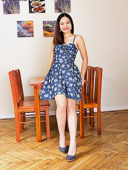 Brunette teenie Tara is seductively demonstrating her horny boob