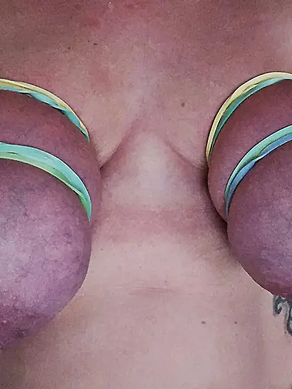 rubber bands on my tits