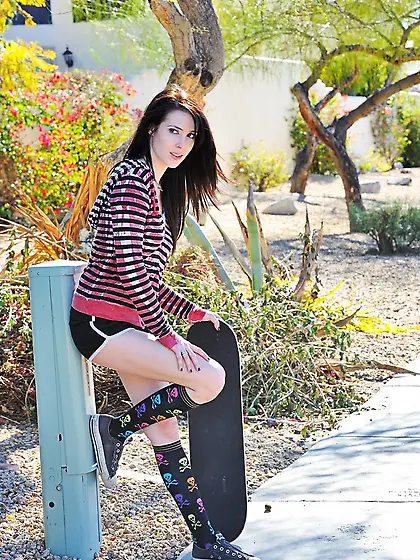 Skater girl teases pussy
