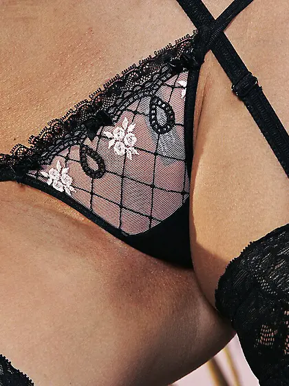 Dark haired Krisztina Banks in beautiful lingerie shows off her