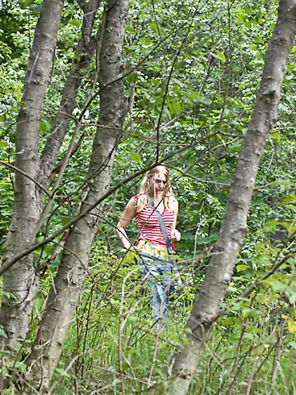 Blonde cutie empties her bladder in the forest