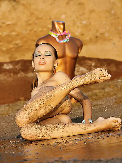 Skinny long legged girl Bunny poses nude on the wild beach showi