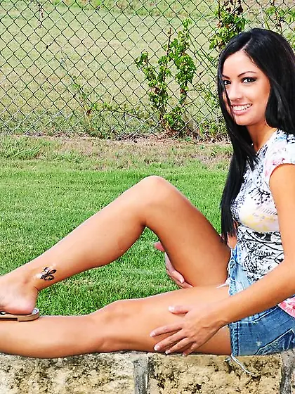 Tanned brunette Cierra Spice with great tits stripping thong and