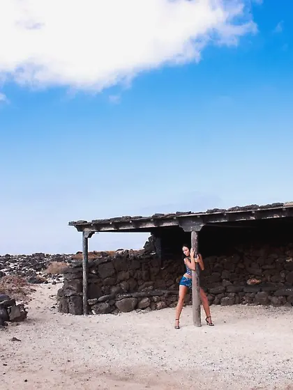 Busty brunette takes off her denim shorts and teases you with th