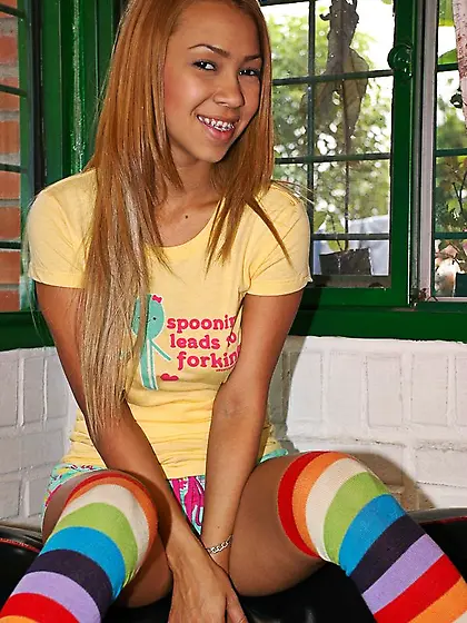 Sexy tanned Tania Spice with big breast wearing half-hose sticki