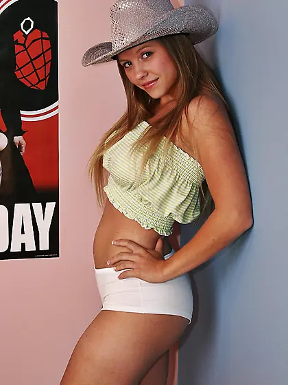 Cute and sexy solo babe,  Dawson Miller gets off her shorts and s