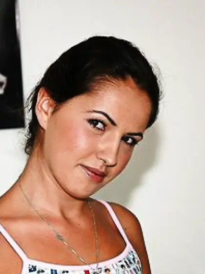 Joyful teen undresses before showing off her trimmed pink cunt i