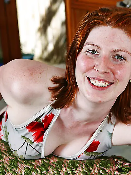 Redheaded beauty shows her crotch and sexy looking booty