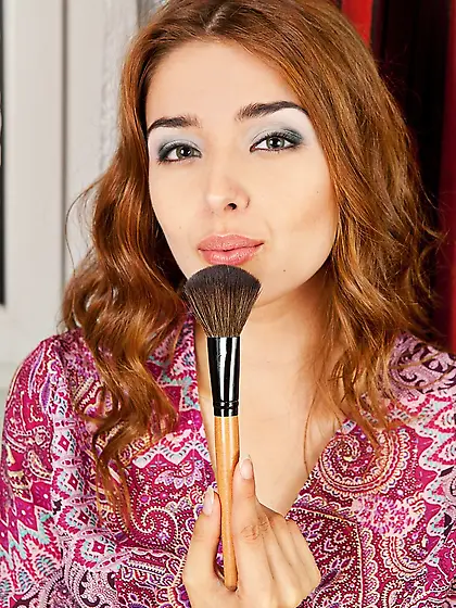 Wavy-haired teen takes off her denim shorts to show off see-thro