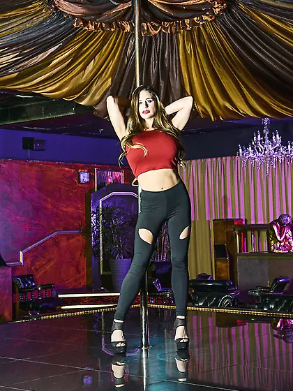 A long legged porn bimbo in sexy pantyhose loves dancing and har