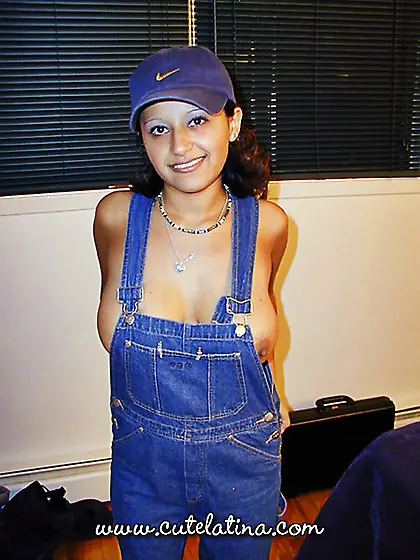 Girl door wears overalls