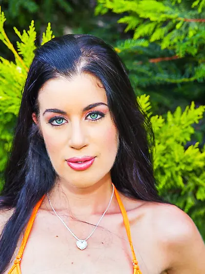 Girl in erotic orange bikini April Blue is shamelessly demonstra