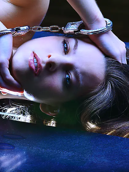 Gorgeous beauty Milla posing naked in hand-cuffs