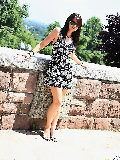 Ann Angel takes her sexy dress outdoorsd and teases us with her