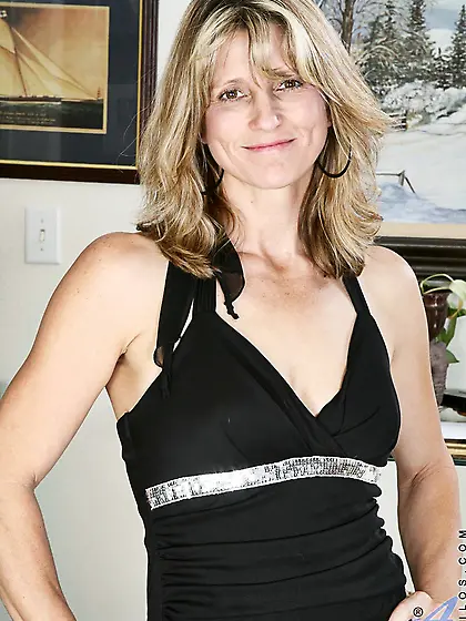 Excited blonde milf Berkely Anilos strips her black dress and pa