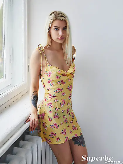 Innocent tattooed blonde shows