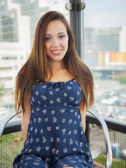 Latina sweetie with pierced nipples takes off blue dress to reve