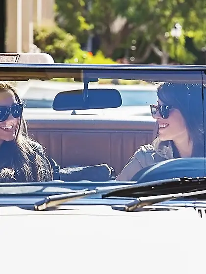 Dani Daniels and Malena Morgan strip together on the bed and hav