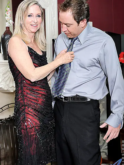 Blonde oldie Annabelle Brady works her mouth and pussy on thick