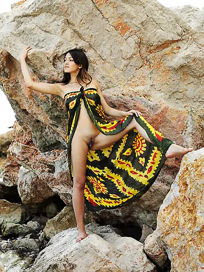 Femjoy Sofie takes her sexy dress outdoors on the rocks and show