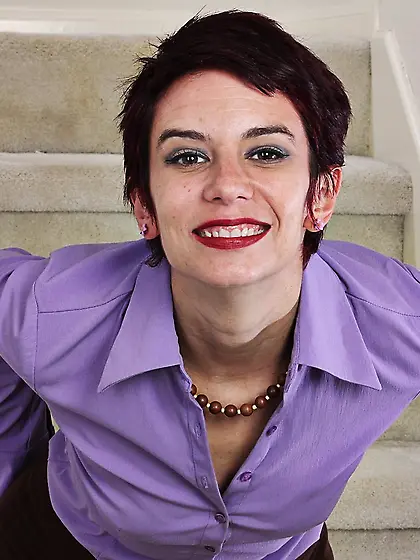 Short-haired brunette MILF with tiny tits shamelessly posing