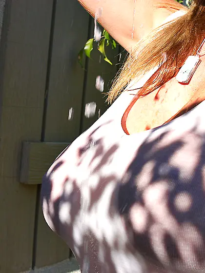 Busty blonde window cleaner showing off her massive wet boobs