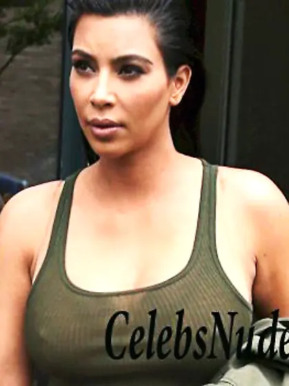 Kim Kardashian Nipple Pokes In A Green Dress