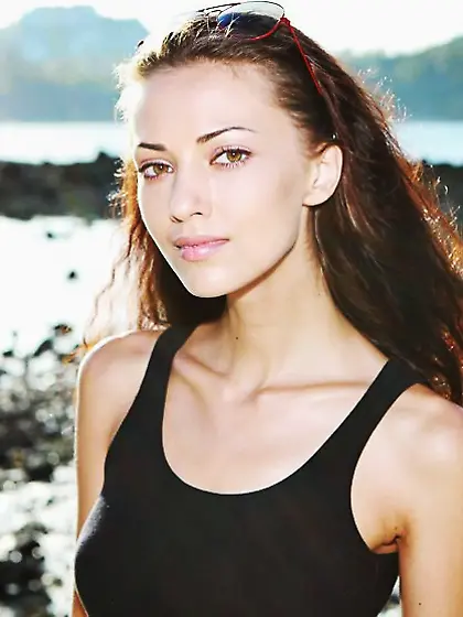 Smoldering young woman posing in sexy swimwear on the beautiful