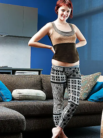 Short hair redhead shows her small tits and insane bush