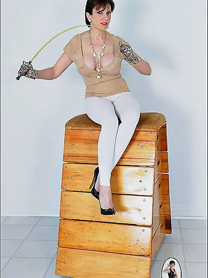 Mature femdom Lady Sonia flaunts her big breasts and hot ass whi