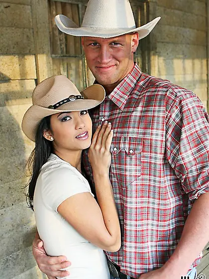 Hot babe Carmen Hart squats to suck cowboy???s thick penis then