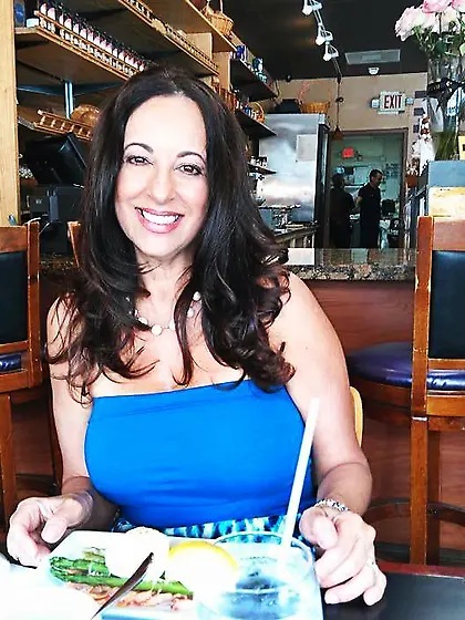 Virginia strikes a pose while showing her tits