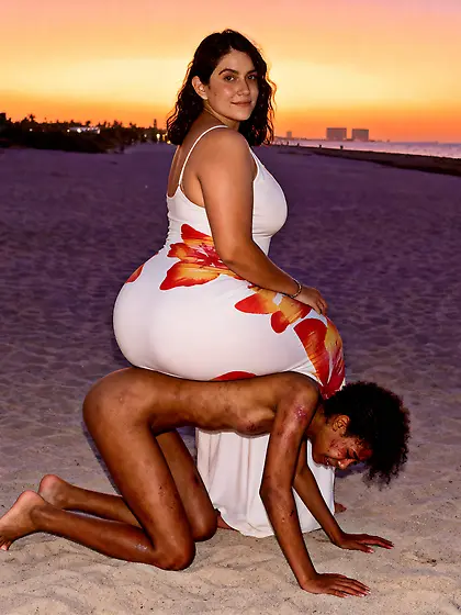 MILF sits on a niggers back